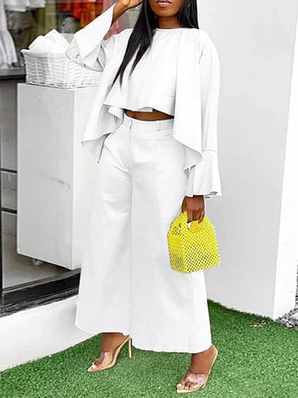 Pantalon à jambes larges, à empiècements, couleur unie