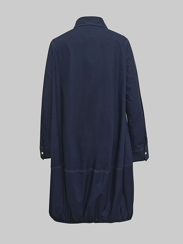 Robe mi-longue ample boutonnée à manches longues, à poches, à col revers, couleur unie