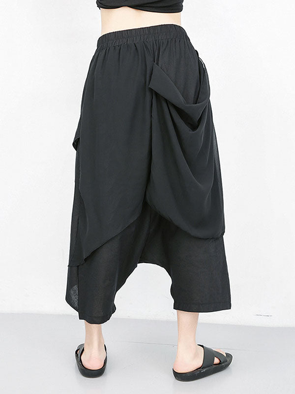 Pantalon 7/8 ample plissé couleur unie