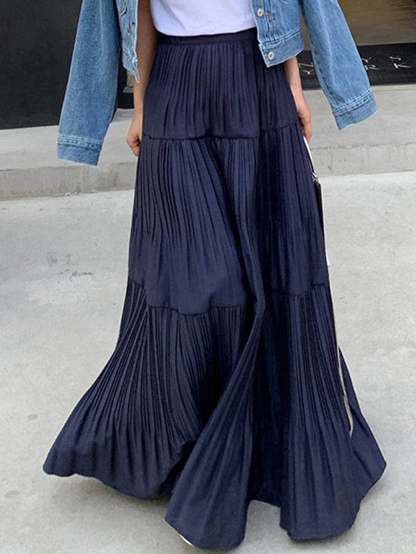 Jupe plissée coupe trapèze, taille haute, à empiècements, couleur unie
