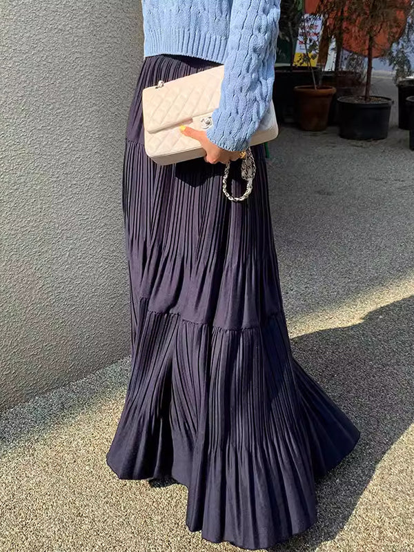 Jupe plissée coupe trapèze, taille haute, à empiècements, couleur unie