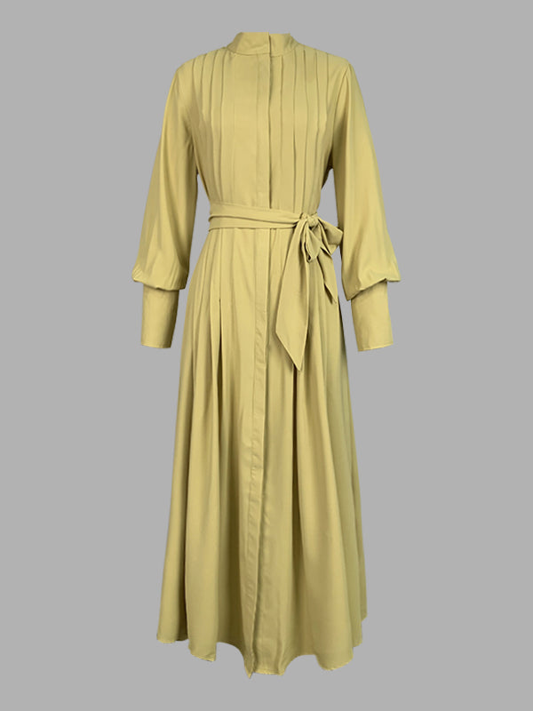 Robe longue boutonnée plissée coupe trapèze, à manches longues, à poches, à taille nouée, à col en V, couleur unie
