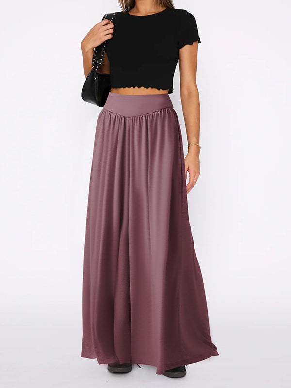 Pantalon ample plissé taille haute, à poches, à empiècements, couleur unie