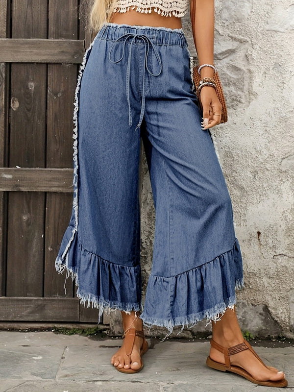 Jean court volanté à jambes larges, à cordon de serrage, à franges, couleur unie