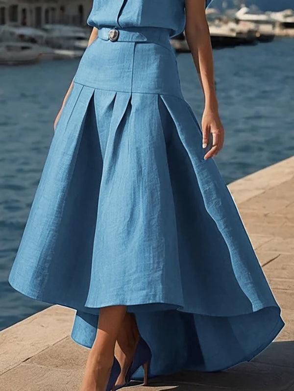 Jupe plissée taille haute, à ourlet plongeant, avec ceinture, couleur unie
