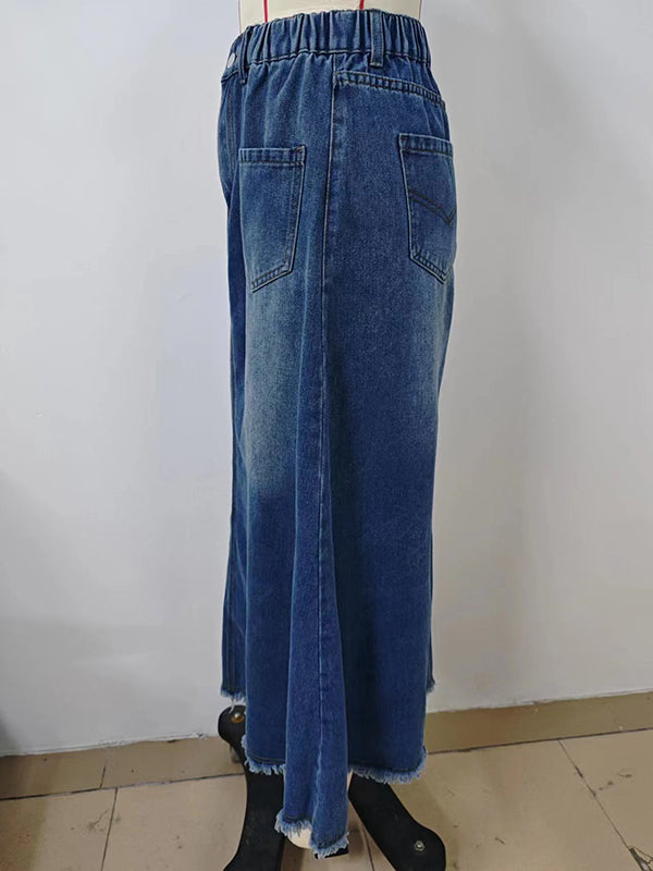 Jupe ample boutonnée coupe trapèze, à taille élastique, à franges, à poches, à empiècements