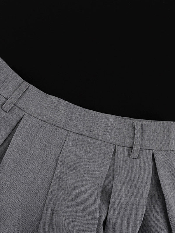Jupe plissée coupe trapèze, taille haute, sans ceinture, couleur unie