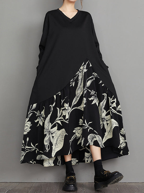 Robe mi-longue asymétrique coupe trapèze, à ourlet plongeant, à imprimé floral, à empiècements, à col en V
