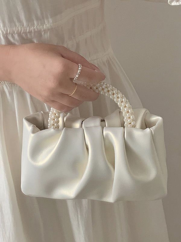 Sac à main perlé à empiècements