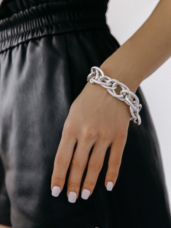 Parure collier et bracelet ajourée couleur unie