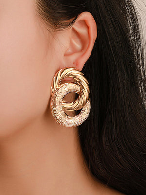 Boucles d'oreilles pendantes géométriques ajourées couleur unie