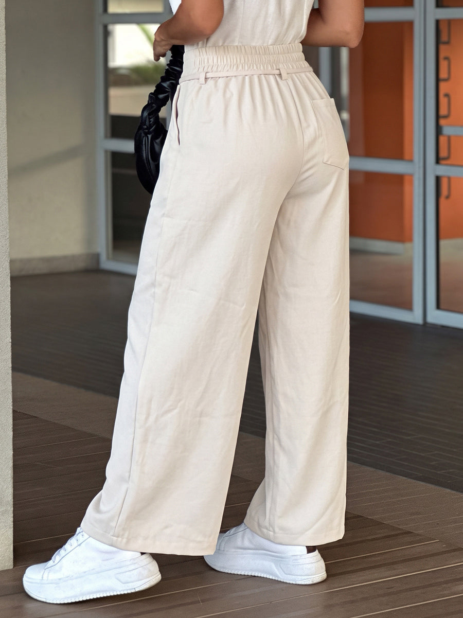 Pantalon ample à poches, à taille élastique, à jambes larges, couleur unie