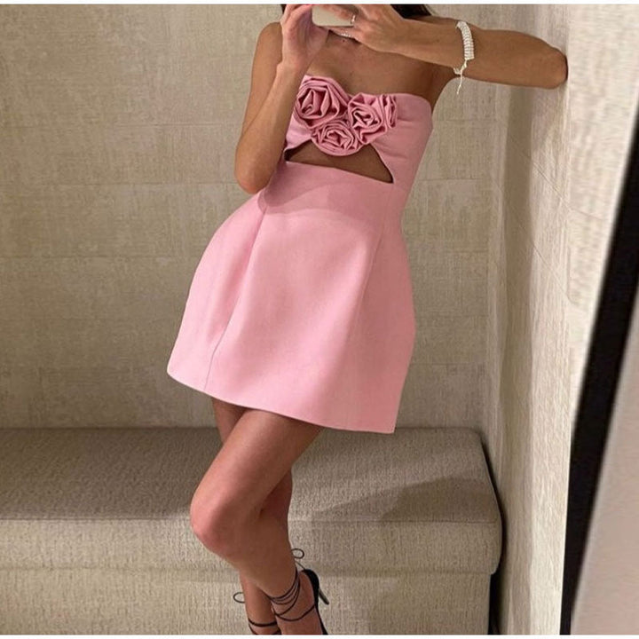 Rana - Robe mini sans bretelles avec décolleté en rose pastel