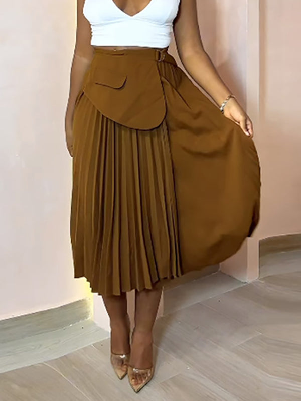 Jupe asymétrique plissée coupe trapèze, taille haute, à empiècements, couleur unie