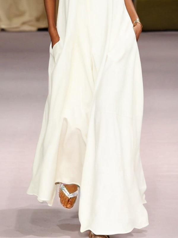 Robe longue ample sans manches, à empiècements, à col rond, couleur unie