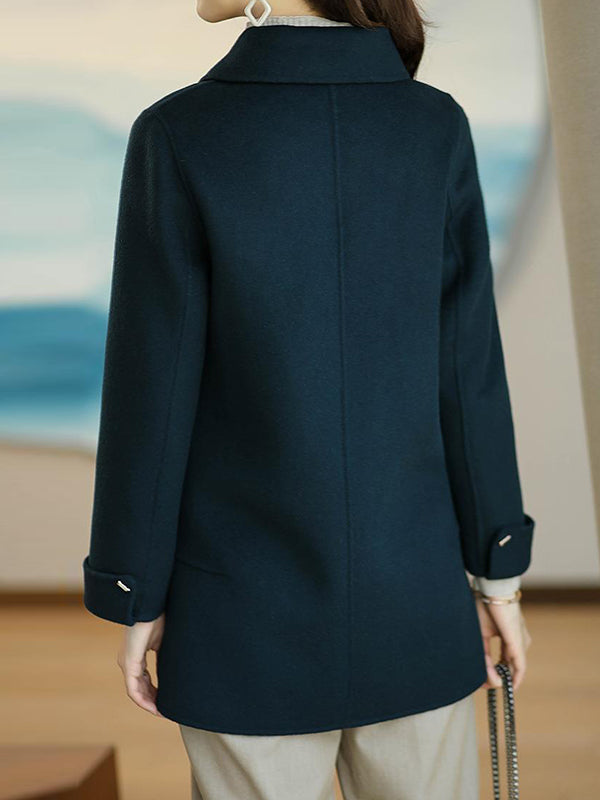 Manteau en laine ample boutonné à manches longues, à poches, à col revers, couleur unie