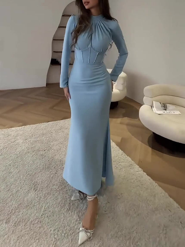 Robe longue moulante plissée nouée à manches longues, à fermeture éclair, à col cheminée, couleur unie