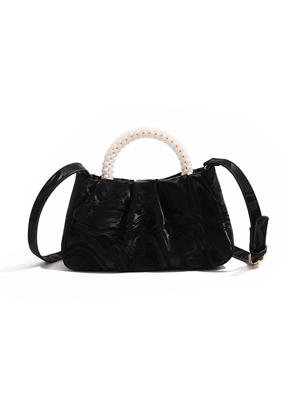 Sac à main perlé à empiècements