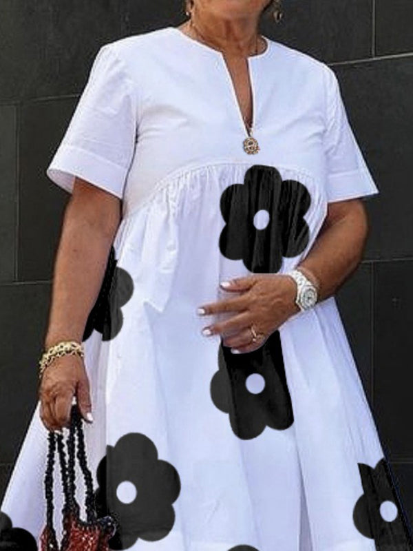 Robe mi-longue ample à manches courtes, à imprimé floral, à col en V