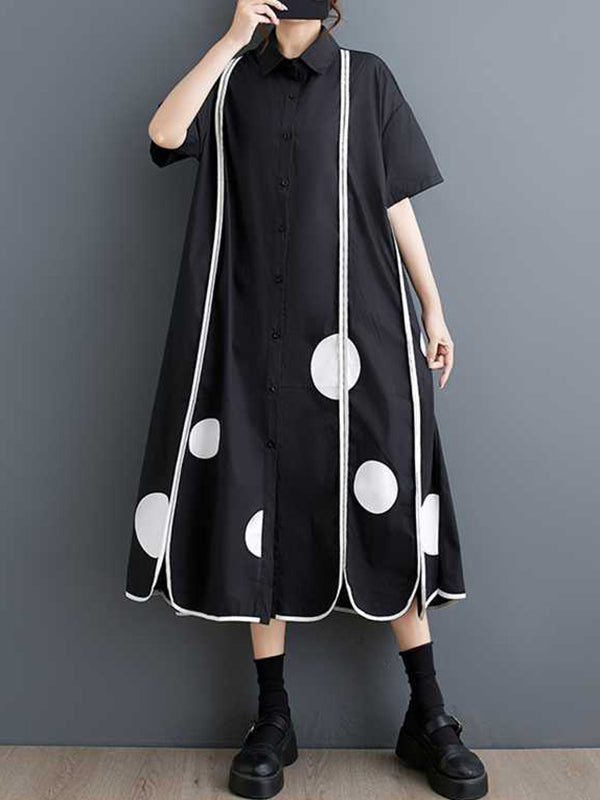 Robe chemise boutonnée fendue devant coupe trapèze, à manches mi-longues, à poches, à pois, à empiècements, à col revers