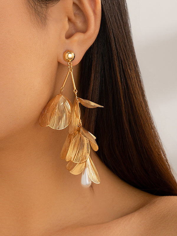 Boucles d'oreilles pendantes géométriques à pompons