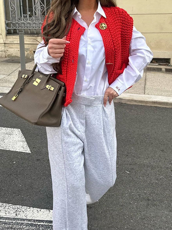 Gilet sans manches ample boutonné à poches, à col en V