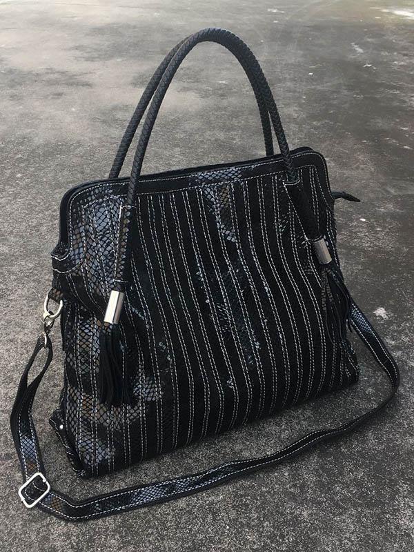 Sac en cuir à bandoulière rayé à empiècements