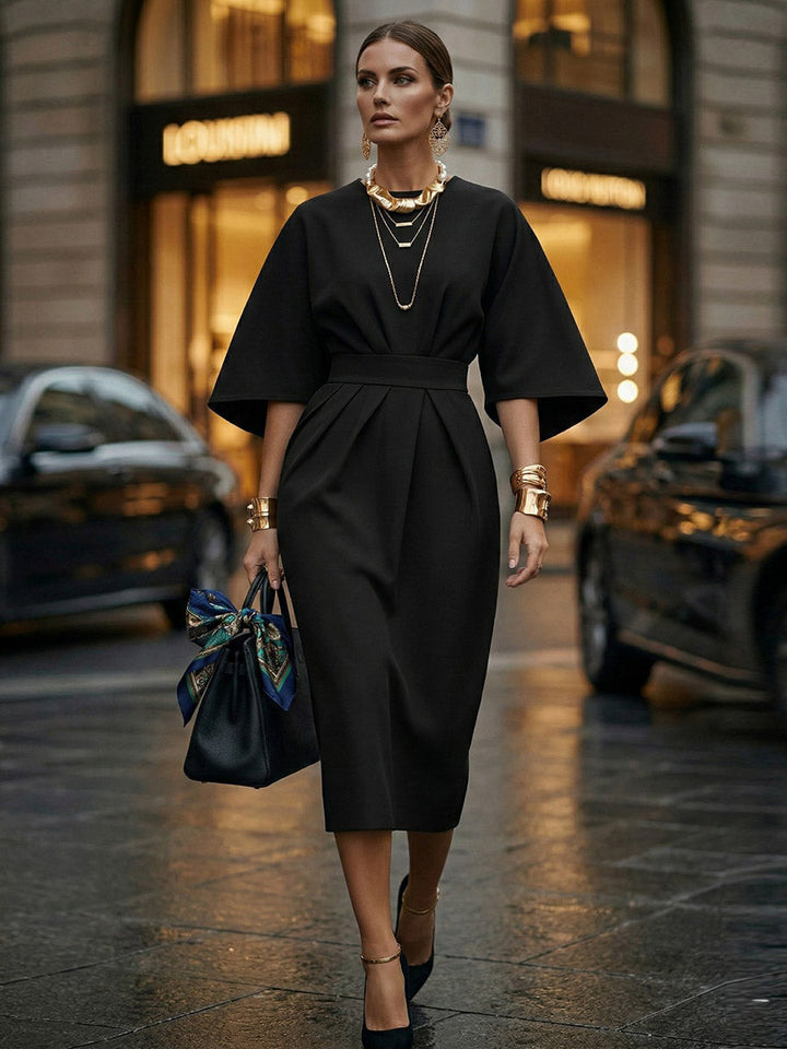 Robe mi-longue plissée à manches chauve-souris, à taille élastique, à empiècements, à col rond, couleur unie