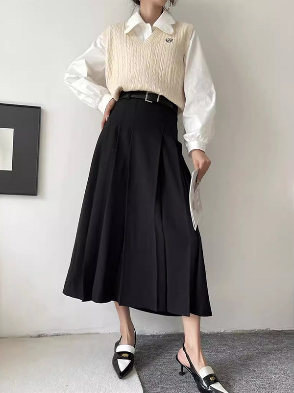 Jupe plissée coupe trapèze, taille haute, à empiècements, couleur unie