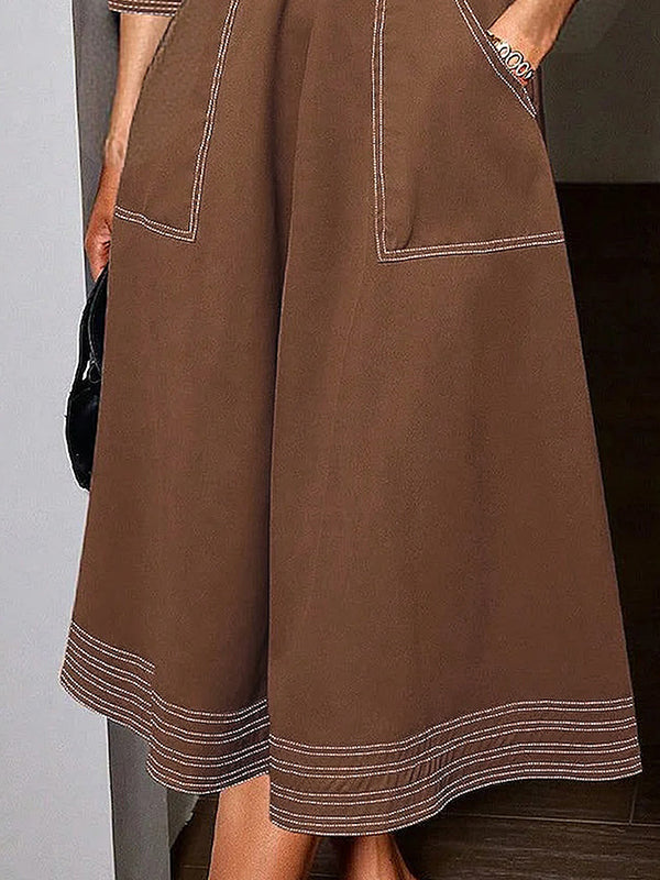 Robe longue ample boutonnée à manches longues, à taille élastique, à poches, à col revers, couleur unie