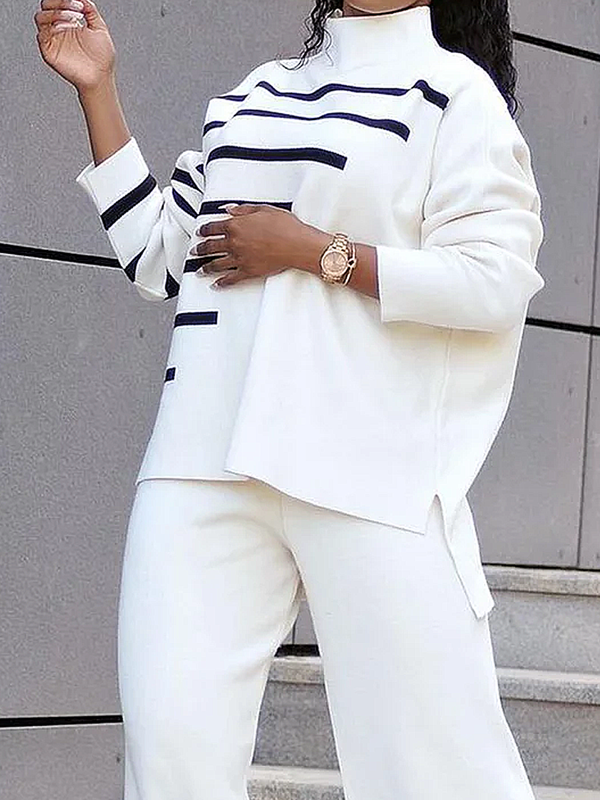 Pull fendu sur le côté à ourlet plongeant, à manches longues, à col haut, couleur contrastée