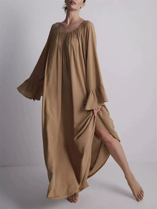 Robe longue ample plissée à manches évasées, à empiècements, à col rond, couleur unie