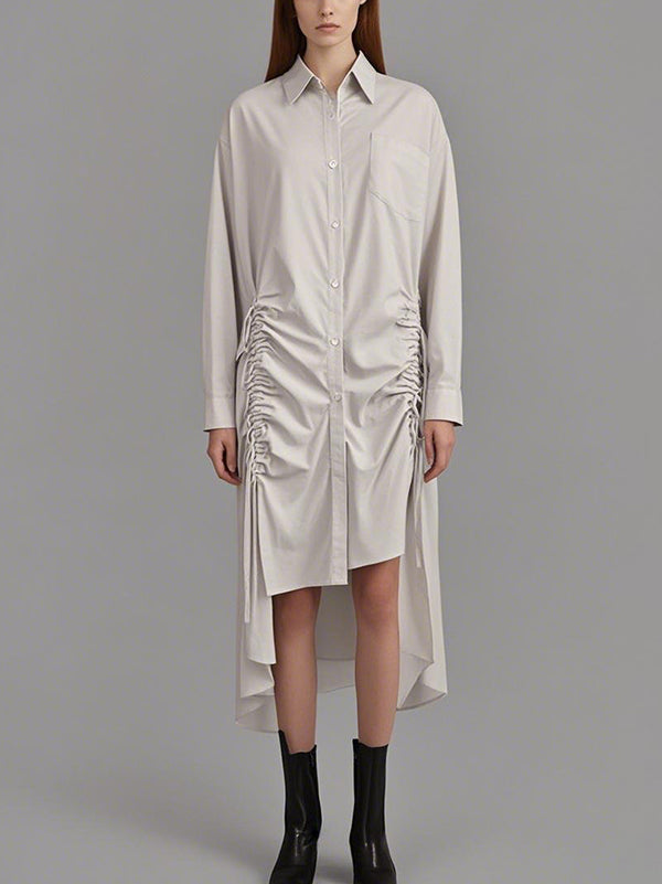 Robe mi-longue boutonnée plissée à ourlet plongeant, à manches longues, à cordon de serrage, à poches, à col revers, couleur unie