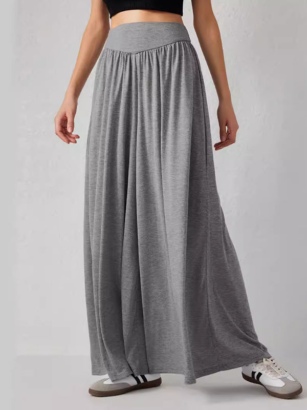 Pantalon ample plissé taille haute, à poches, à empiècements, couleur unie