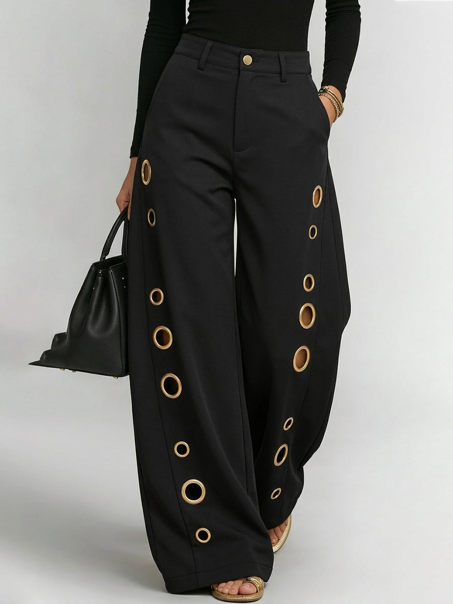 Pantalon boutonné ajouré taille haute, à jambes larges, à poches, à empiècements, couleur unie
