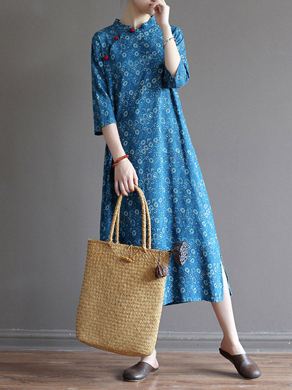 Robe mi-longue originale à col montant et motif floral uni