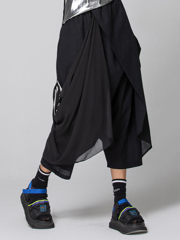 Pantalon 7/8 ample plissé couleur unie