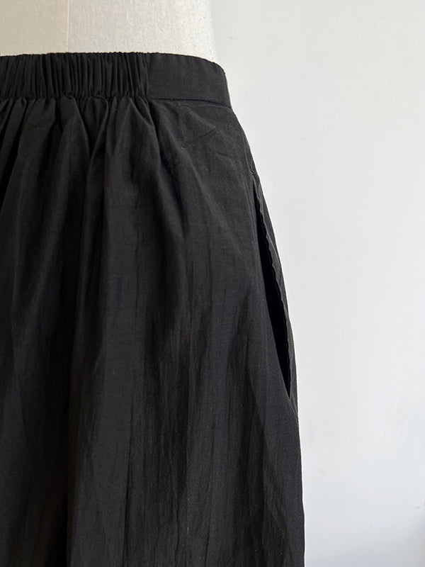 Pantalon taille haute, à taille élastique, à empiècements, couleur unie