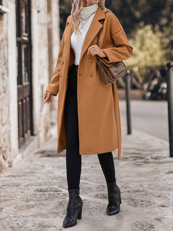Manteau en laine ample boutonné à manches longues, à empiècements, à taille nouée, à col cranté, couleur unie