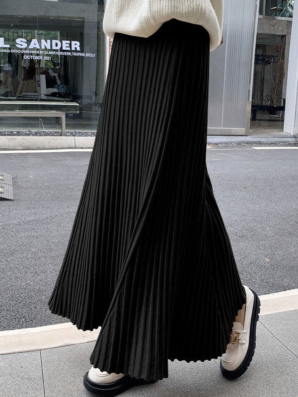 Jupe plissée coupe trapèze, taille haute, couleur unie