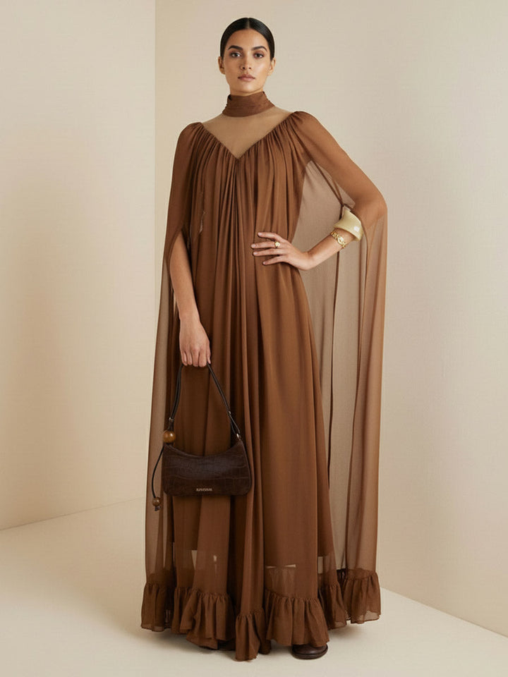 Robe longue superposée plissée volantée transparente style cape, à coupe irrégulière, à empiècements, à col haut, couleur unie