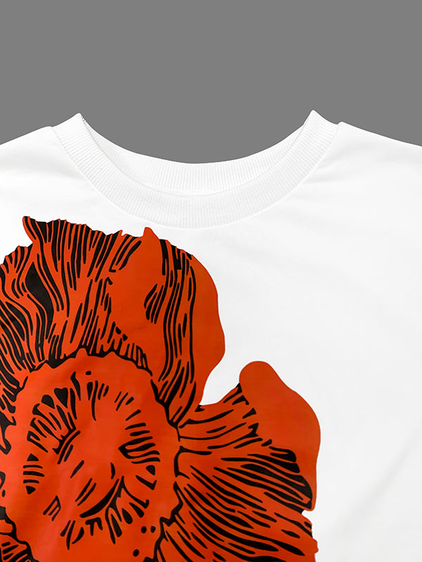 T-shirt à manches évasées, à manches longues, à imprimé floral, à col rond