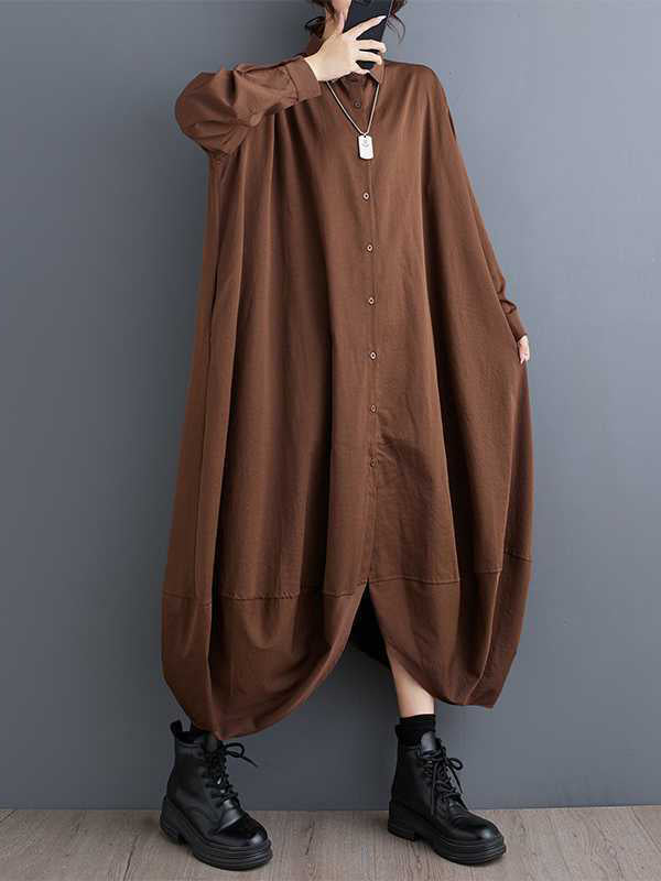 Robe chemise boutonnée coupe trapèze, à manches longues, à poches, à empiècements, à col revers, couleur unie