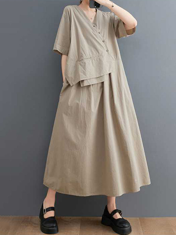 Robe mi-longue ample plissée à manches courtes, à empiècements, à col en V, couleur unie
