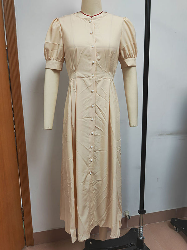Robe chemise boutonnée à manches bouffantes, à manches courtes, à col rond, couleur unie