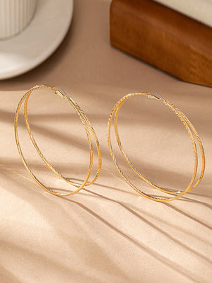 Boucles d'oreilles géométriques superposées
