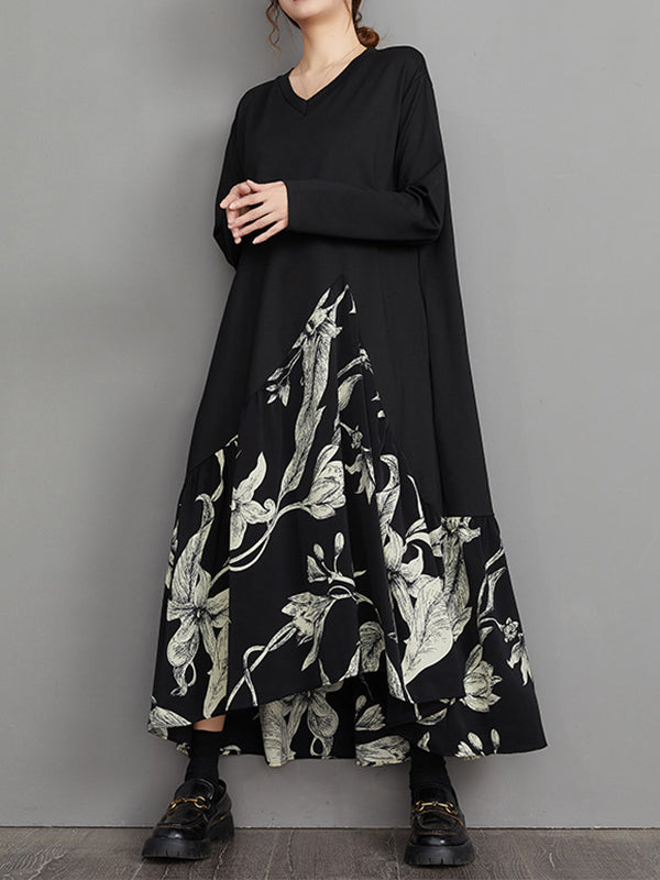 Robe mi-longue asymétrique coupe trapèze, à ourlet plongeant, à imprimé floral, à empiècements, à col en V