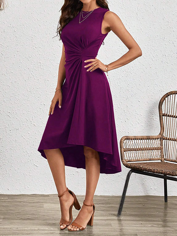 Robe mi-longue asymétrique plissée coupe trapèze, taille haute, à empiècements, à col rond, couleur unie