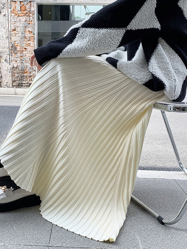 Jupe plissée coupe trapèze, taille haute, couleur unie