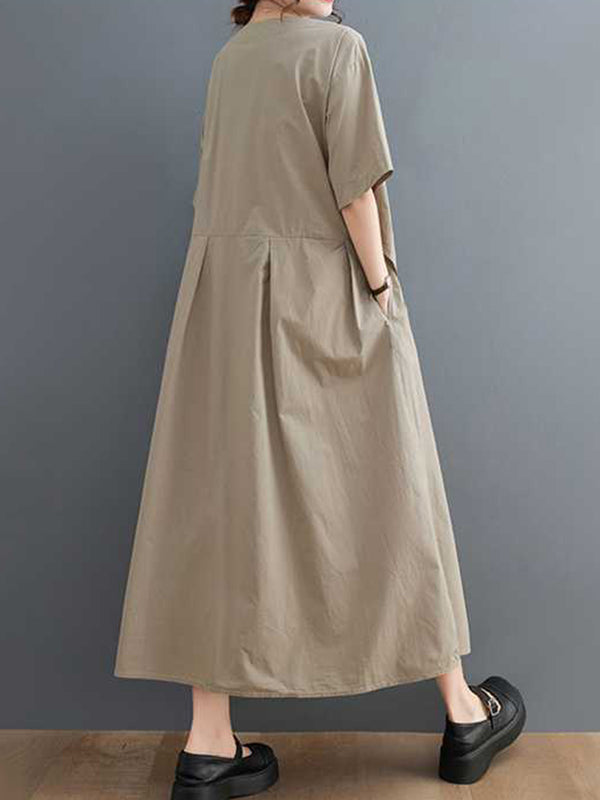 Robe mi-longue ample plissée à manches courtes, à empiècements, à col en V, couleur unie